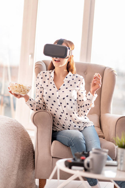 Brunette appealing woman watching VR film - Foto, Imagem