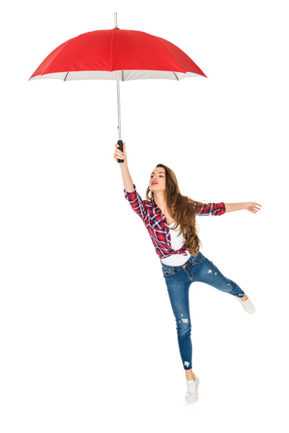 beautiful young woman holding red umbrella isolated on white - Фото, зображення