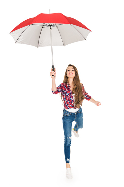 happy young woman holding red umbrella isolated on white - Photo, Image