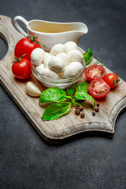 Italian mozzarella cheese and tomatoes. Caprese salad ingridients - 写真・画像