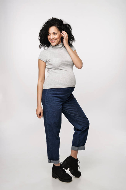 Pregnant woman standing in full length - Foto, Imagem