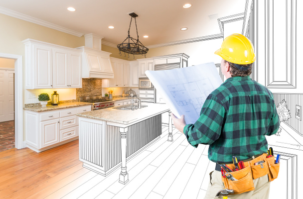 Male Contractor with Hard Hat and Plans Looking At Custom Kitchen Drawing Photo Combination On White. - Photo, Image