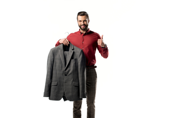 stylish man with jacket in hand showing thumb up isolated on white - Φωτογραφία, εικόνα