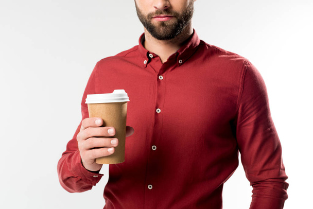 cropped shot of man with coffee to go in hand - Zdjęcie, obraz