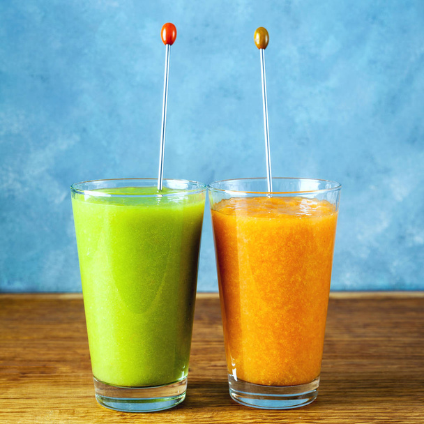 Freshly blended fruit smoothies of various colors and tastes in  - Photo, Image