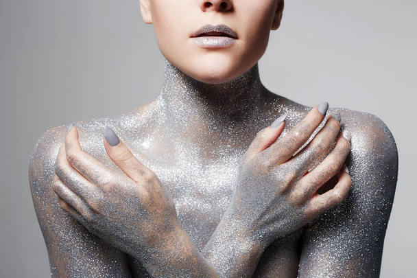 Silver Girl. Beautiful Woman in Sparkles - Foto, Imagen