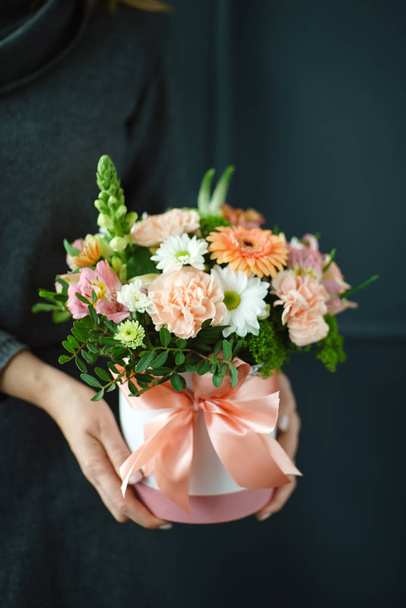 nice bouquet in the hands of woman, close up - Fotografie, Obrázek