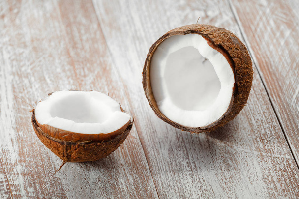 coconut on a wooden background - Foto, immagini