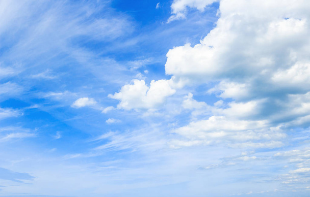 Blue sky and white clouds with sun light skyline background. - Φωτογραφία, εικόνα