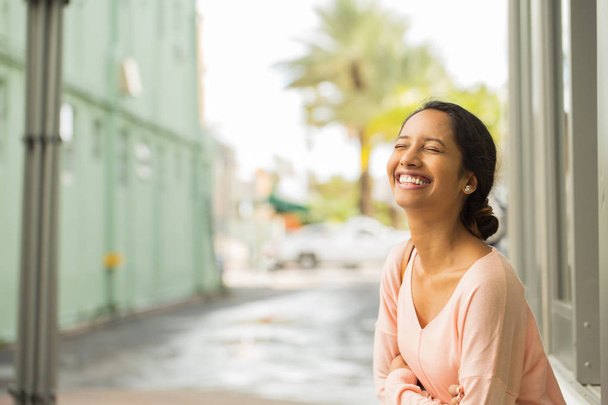 Young beautiful hispanic woman smiling. - Photo, Image