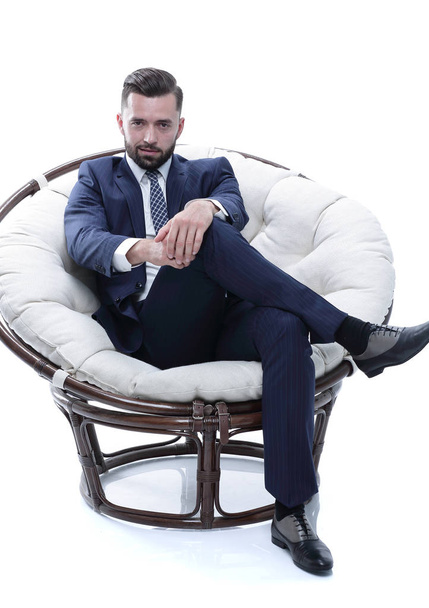 businessman sitting in a comfortable chair - Fotó, kép
