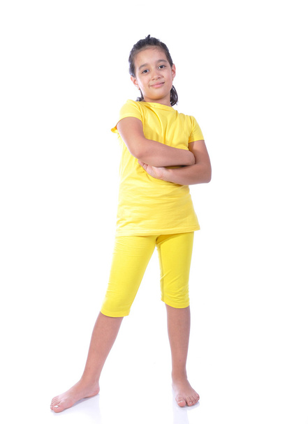 Beautiful girl in yellow isolated - Foto, Bild