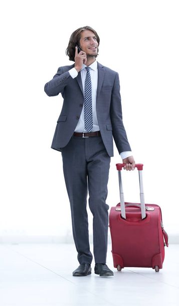 successful businessman with travel suitcase - Foto, Imagen