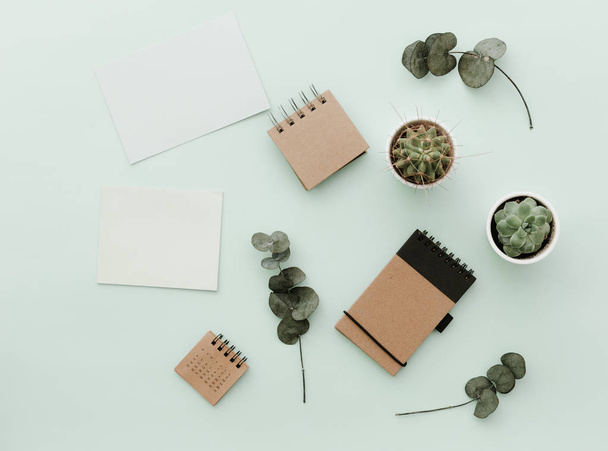 Minimalist Lifestyle For Website, Marketing, Social Media with eco craft notebook and green leaves  - Φωτογραφία, εικόνα