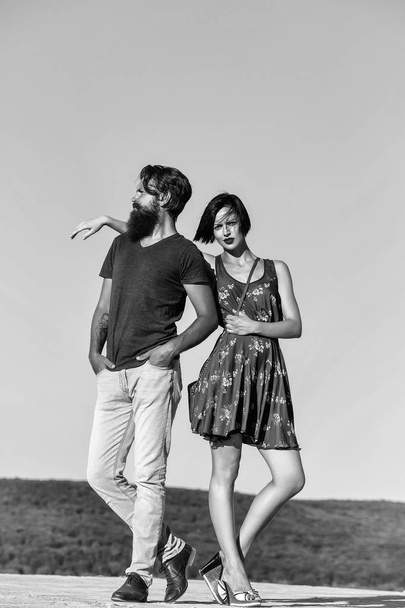 Couple pose on blue sky - Valokuva, kuva