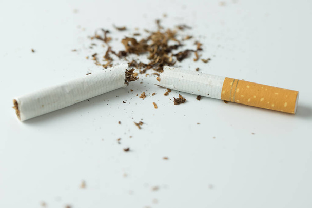Quit smoking concept by breaking the cigarette - Fotó, kép