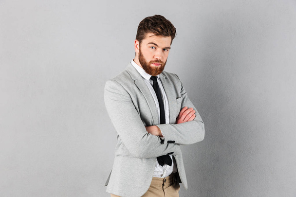 Portrait of a confident businessman dressed in suit - Foto, imagen
