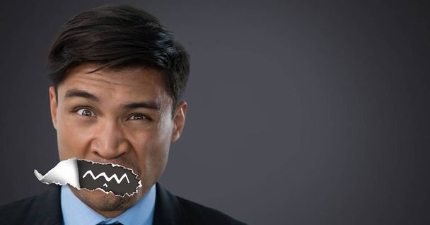 Digital composite of Man with torn paper on mouth and drawn mouth - Φωτογραφία, εικόνα