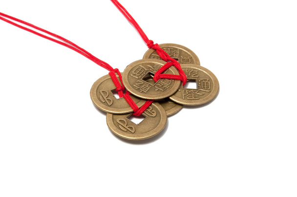 three chinese lucky coins with red knot on the white - Photo, Image
