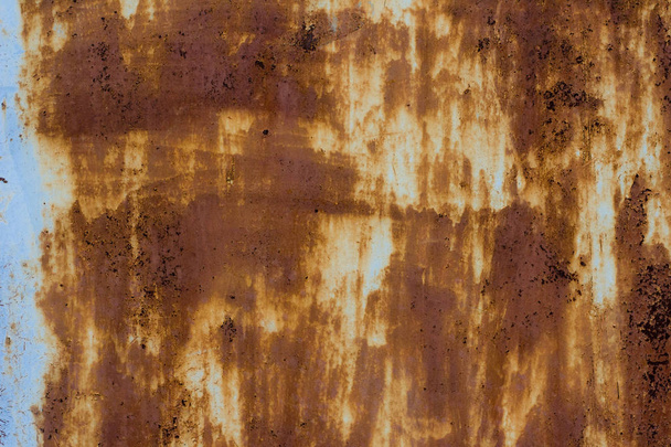 塗料や錆の多くの層を持つヴィンテージさびた鋳鉄壁背景のテクスチャ - 写真・画像