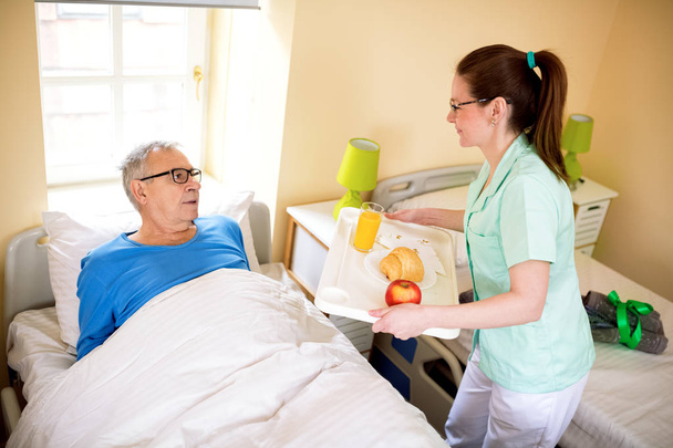 Compele a favor at nursing home - Photo, Image
