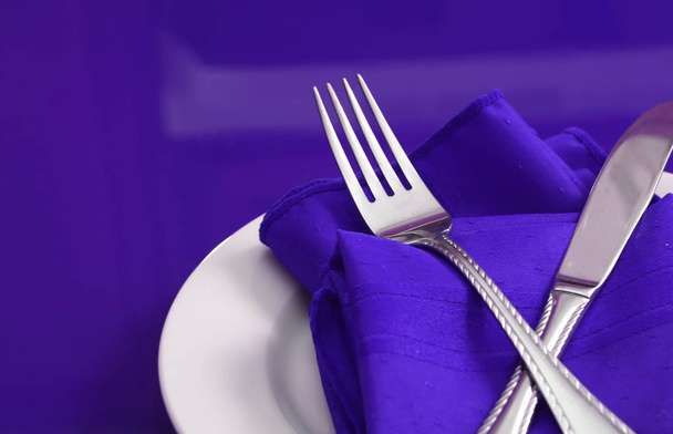 An elegant holiday table setting in purple - Photo, Image