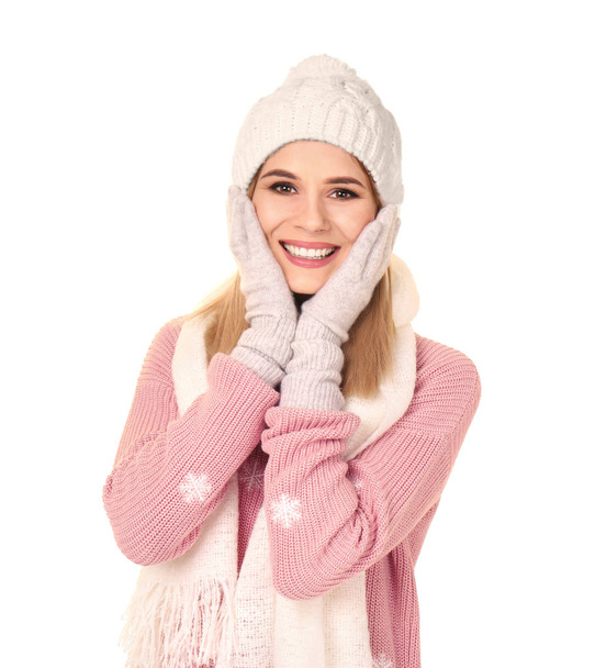Young woman in warm clothing on white background. Ready for winter vacation - Foto, Imagem