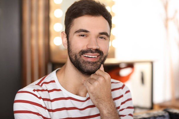 Young bearded man in casual clothes indoors - Foto, Imagem