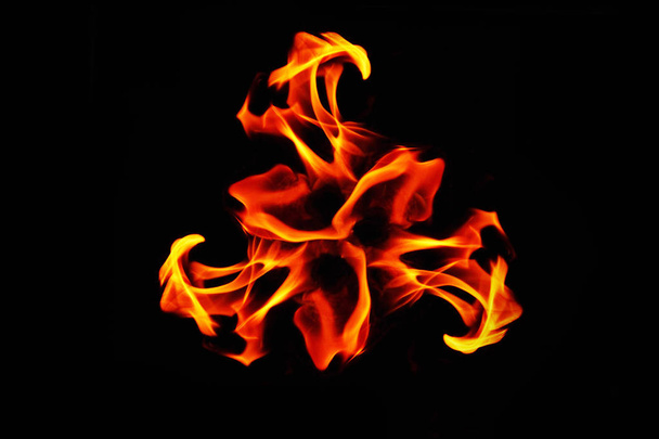 Abstract fire figure.Pattern.Fire flames on black background..Abstract background .Isolated on black - Foto, Bild