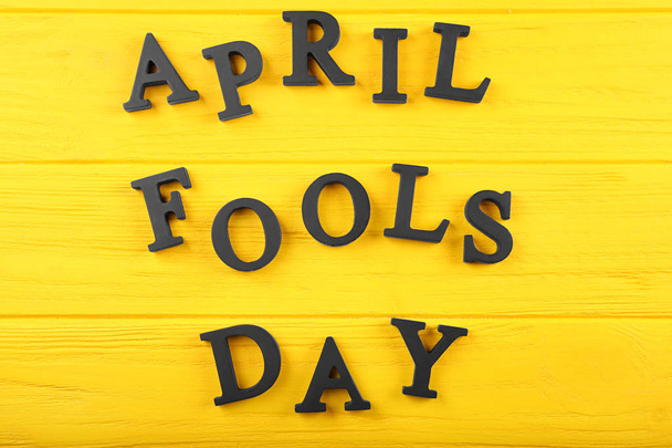 Phrase April fools day on color background - Foto, Imagem
