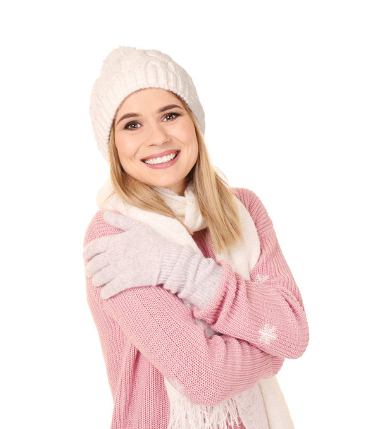 Young woman in warm clothing on white background. Ready for winter vacation - Фото, изображение