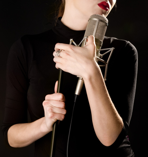 Woman with microphone - Valokuva, kuva