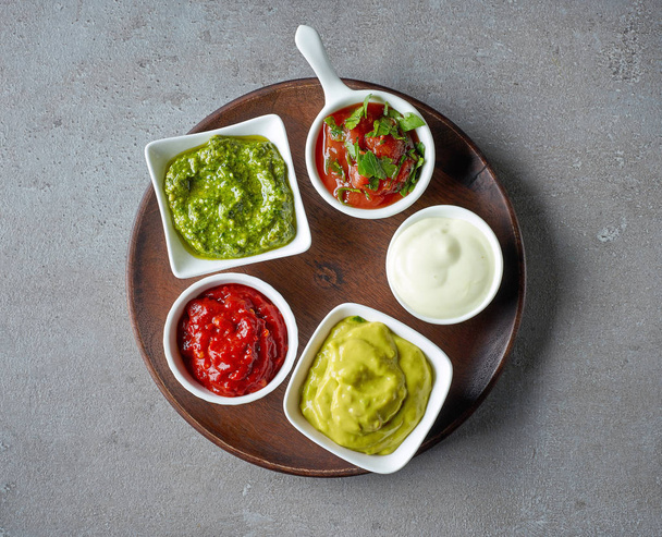 various sauces on grey table - Photo, Image