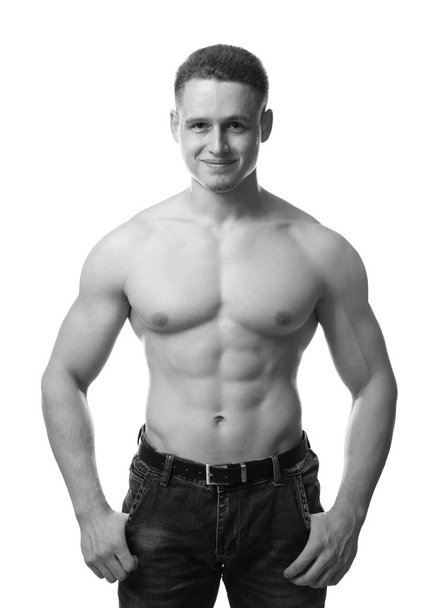 Portrait of muscular young bodybuilder on white background, toned effect - Photo, Image