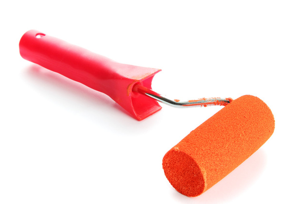 roller with orange paint isolated on white - Foto, afbeelding