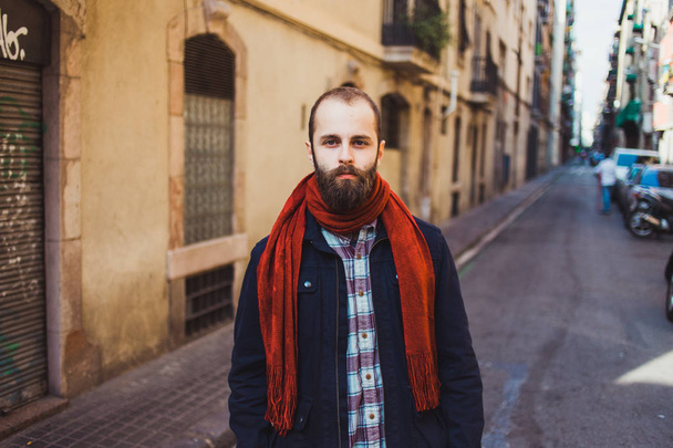 Casual bearded man in outerwear on street - Foto, imagen