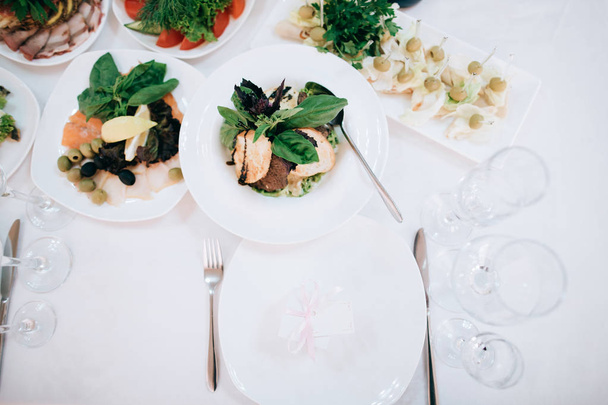table full of meal served for wedding celebration - Fotó, kép