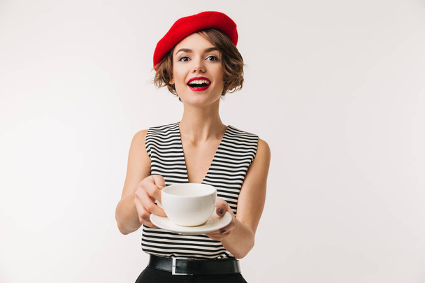 Portrait of n excited woman wearing red beret - Fotó, kép