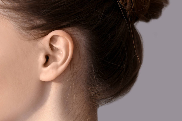 Young woman with hearing problem, closeup - Φωτογραφία, εικόνα
