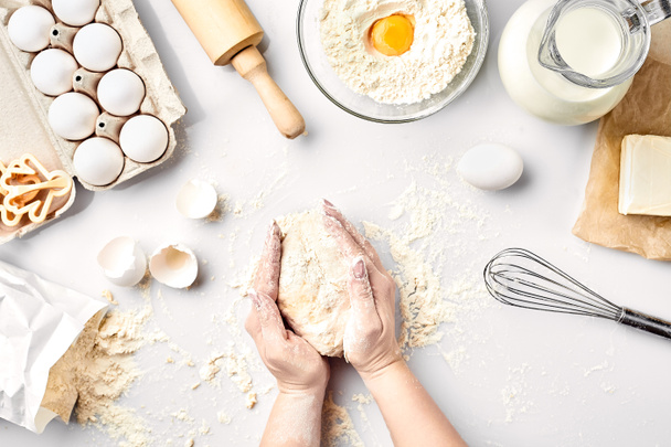 Baker preparing to knead the dough, top view. Cooking, bakery concept - Photo, Image