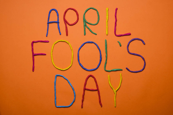 Funny font first april fools day written in plastecine of different colors. - Foto, immagini