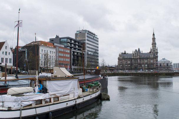 Boats and buildings of the docks in Antwerp, Belgium - Photo, Image