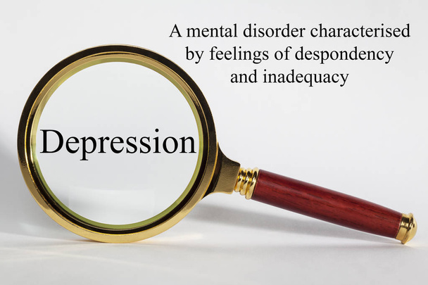 Depression Concept with Words and Magnifying Glass - Foto, Imagen