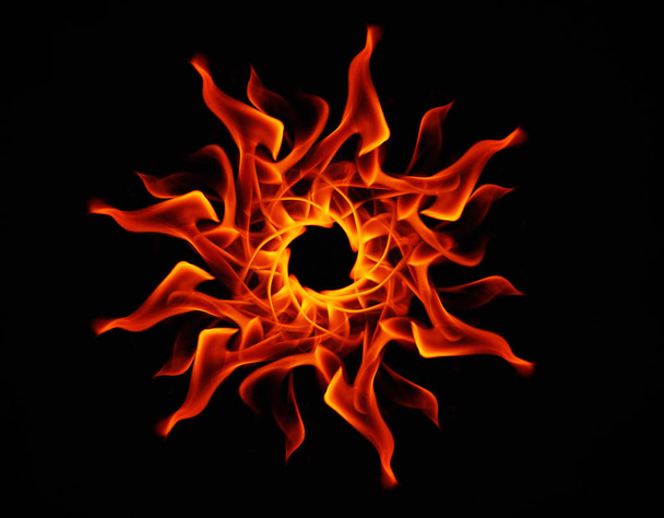 Fire flames on black background.Abstract fire.Abstract background .Isolated on black - Fotoğraf, Görsel