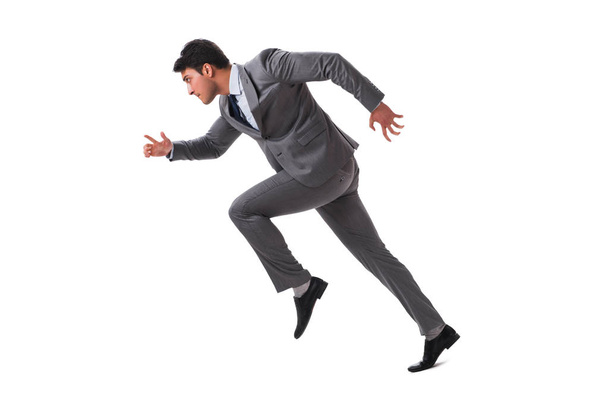 Joven hombre de negocios corriendo hacia adelante aislado en blanco
 - Foto, Imagen