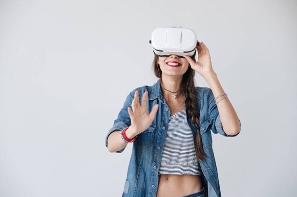 Happy hipster experiencing vr glasses - Photo, Image