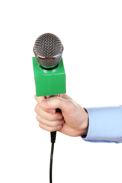 Male hand with microphone isolated on white - Foto, afbeelding