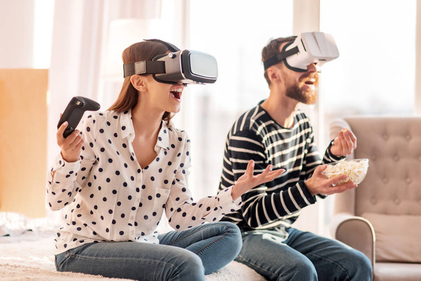 Cheerful gay couple involving in VR - Foto, Imagen