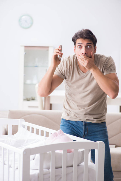 Young father dad frustrated at crying baby - Photo, image