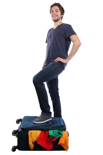 Packing suitcase luggage bag young man travel traveling vacation - Foto, Imagen